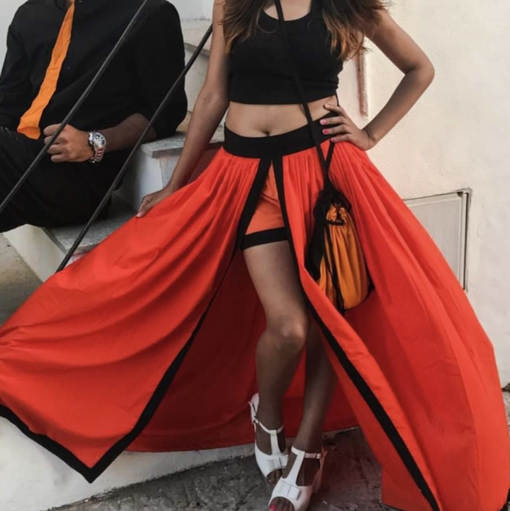 Top, skirt, short and coin bag set.